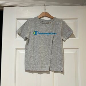 Champion Tee